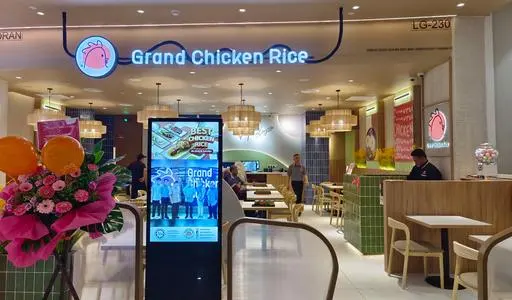 Self-service kiosk at a restaurant entrance